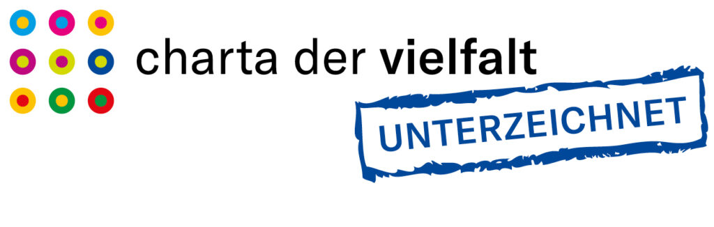 Das Logo der Charta der Vielfalt ist zu sehen, inklusive dem Schriftzug "Unterzeichnet"